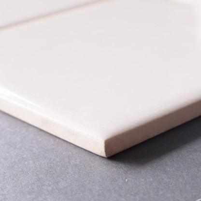 半磁器タイル 100角タイル 平【TOTO】内装壁タイル イベル （薄いサンドベージュ）AA10#52｜廃盤品