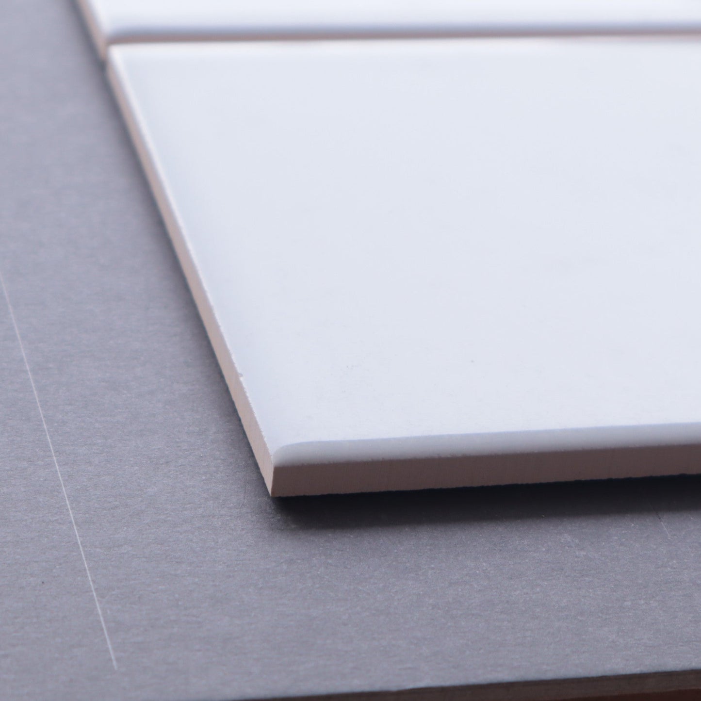 半磁器タイル 100角タイル 平【TOTO】内装壁タイル イベル （灰色よりの水色）AA10#72｜廃盤品